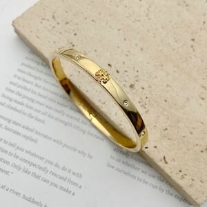 Tory Burch Elegant Gold Bangle Bracelet